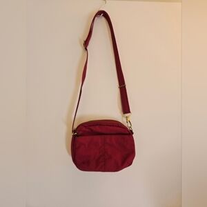 Travelon Burgundy Nylon  Crossbody Travel Bag.